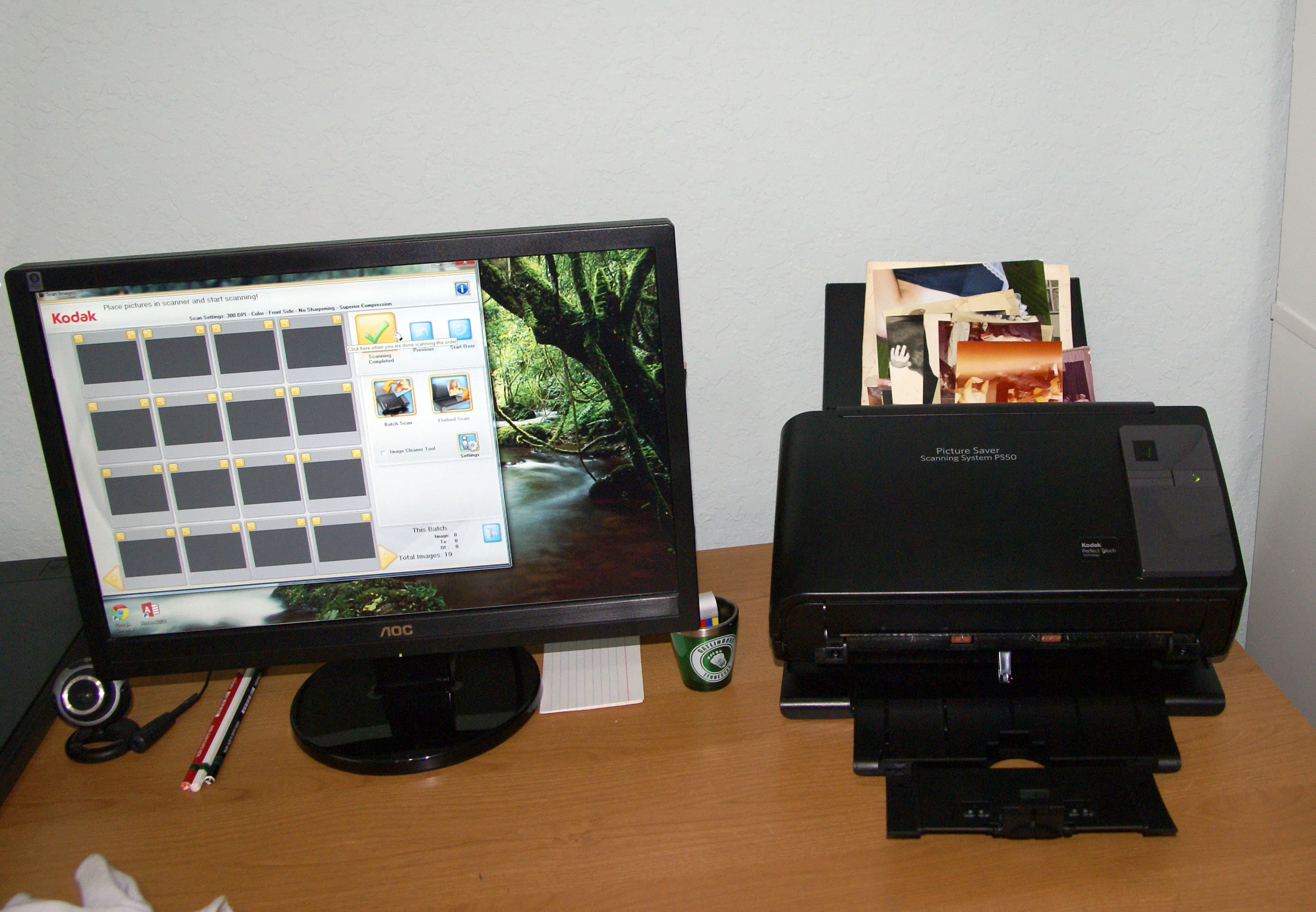 Photo scanning service - Kodak scanner with photos